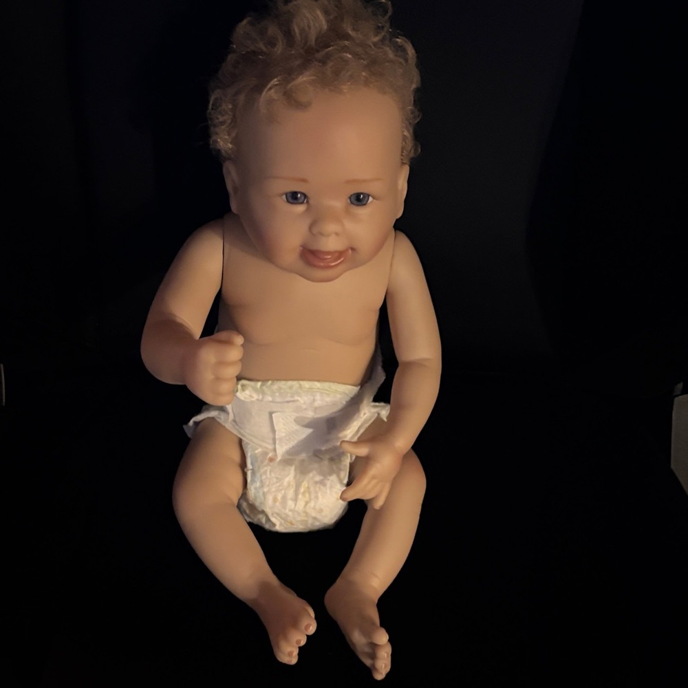 Realistic Baby Doll with Curly Hair